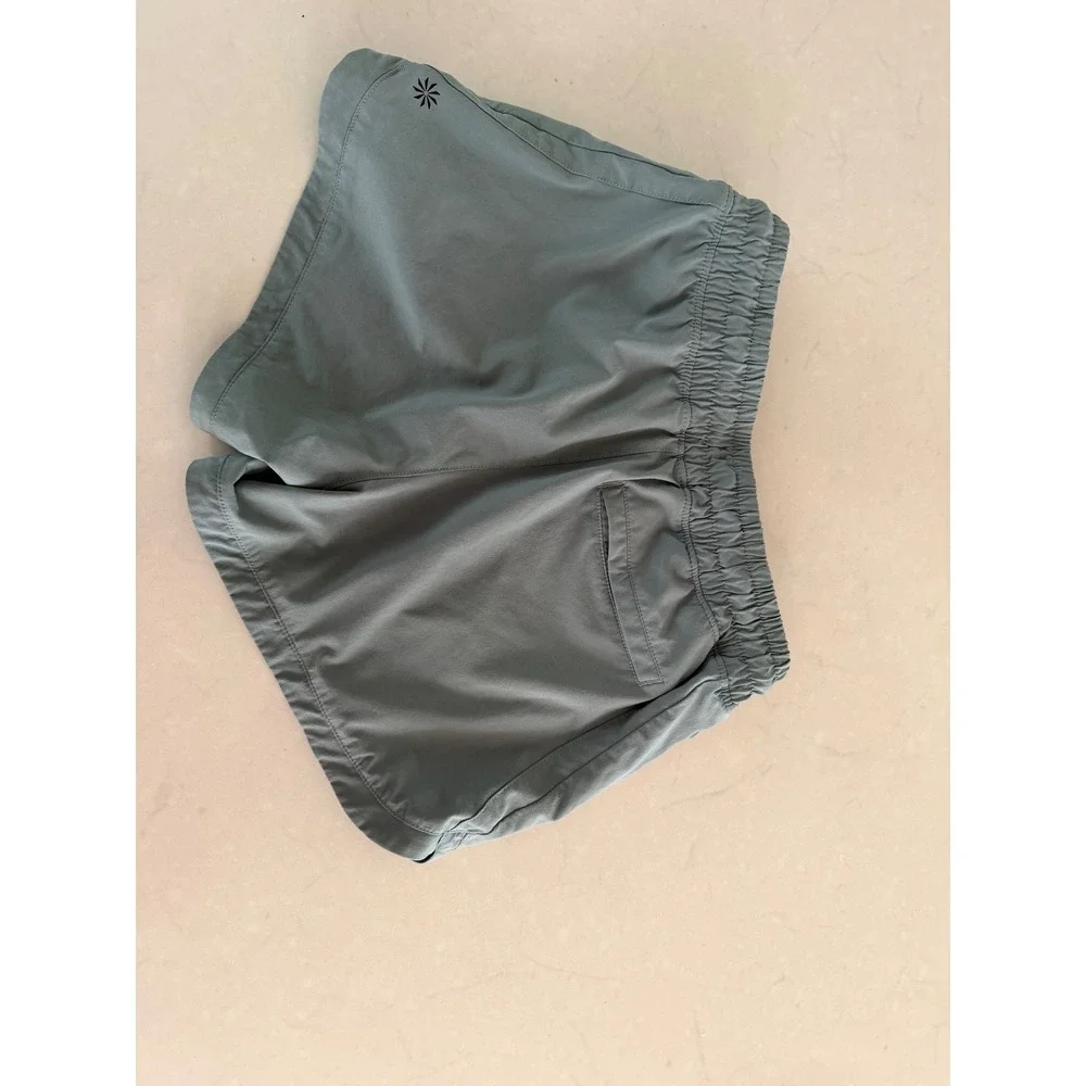 Athleta Girl Sage Green Athletic Shorts XL 14 Drawstring Waist Zipper Pockets